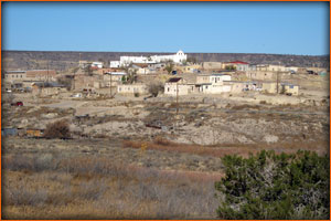 The morning daylight showed this beautiful quaint Indian pueblo village with the church looking down from on high at the pueblo