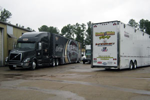 Felix the Cat was hanging out in some pretty high end company. One of the Alan Johnson owned Top Fuel team rigs awaiting its turn.